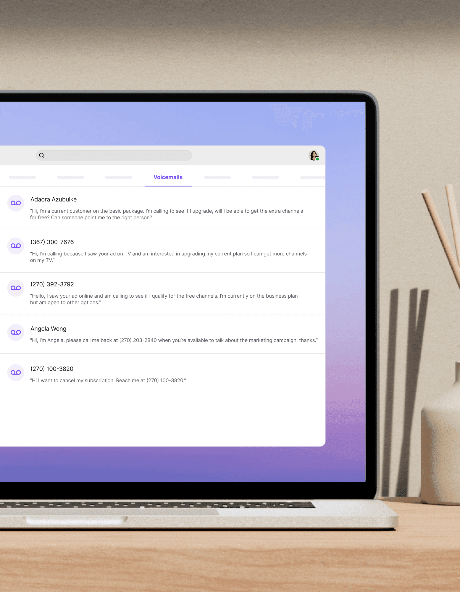 Computer and mobile app showing Dialpad transcribing a voicemail message in real time